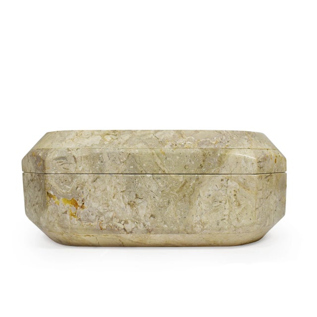 Stylish and chic solid stone box with unique ivory color and stunning exotic natural patterns. It expresses the meeting of...