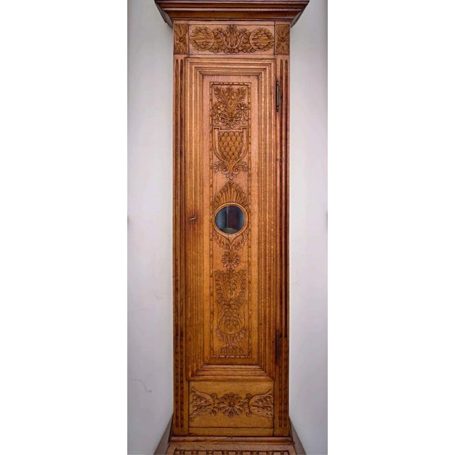 Richly carved floor clock. Half with striking. The clock is restored - fully functional. Body made of solid oak. Numerals...
