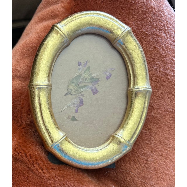Lovely little purple flower with greenery on brown cardstock. A natural specimen in mint condition, framed under glass in...