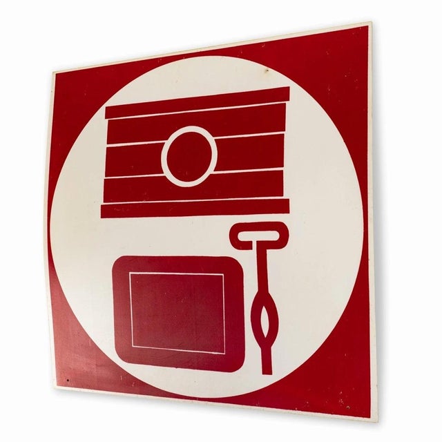 Wall sign from a canned food store. The sign is made of plastic and has a simple image of two types of tinned food with a...