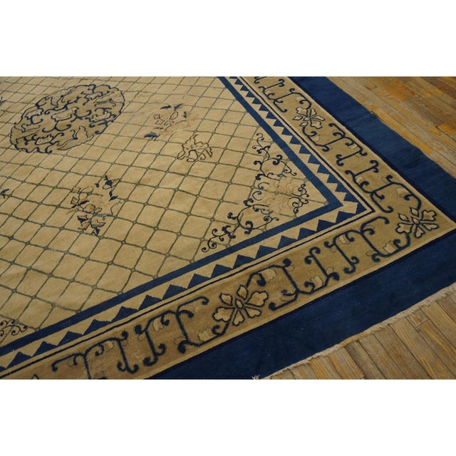 Antique Chinese - Peking Medium Wool Blue Rug, Country of Origin: China, Circa Date: 1890s. This exceptional example of...