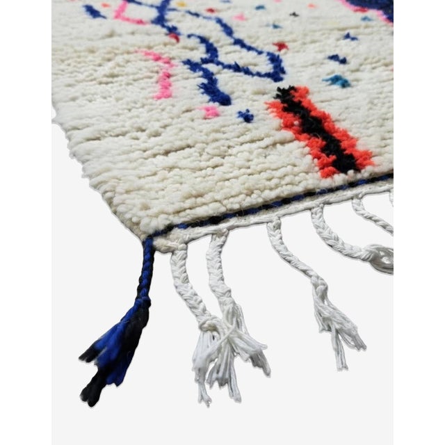 Contemporary Moroccan Rug – Handmade Abstract Azilal Wool Rug This contemporary Moroccan rug combines expressive Berber...
