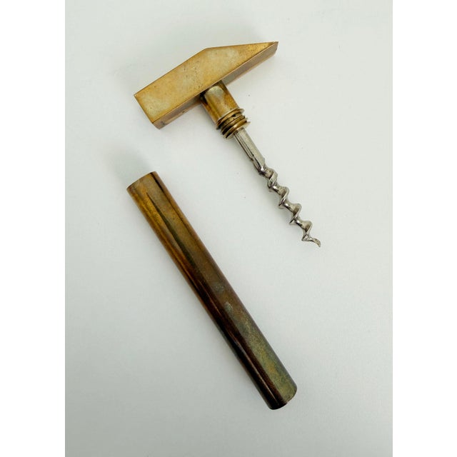 Italian-made corkscrew sold by luxury department store Bonwit Teller, circa 1970s. Twist off the top of the stylized...