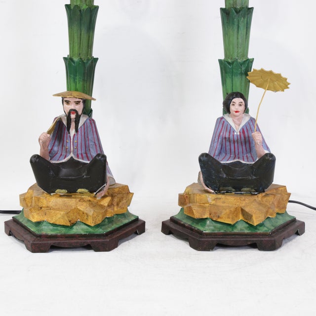 This striking pair of vintage-style tole table lamps embodies the eclectic charm of Chinoiserie and Hollywood Regency...