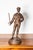 This early 20th-century French bronze trophy beautifully captures the elegance and athleticism of fencing, featuring a...