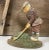 This decorative fine cast iron door stop of a primitive Golf Player is in original painted surface in beautiful colours,...