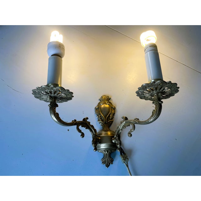A striking, two-arm wall sconce manufactured by POLAM-MEOS in Warsaw. This model features an elegant palace style...