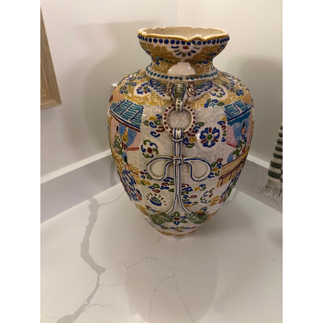 Bring timeless artistry into your home with this beautiful large vintage Japanese Satsuma-style vase, richly decorated...