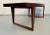 Beautiful mid-century modern Danish coffee table crafted from rich rosewood. The gently curved design highlights the...