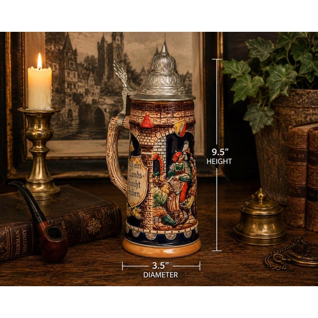 Vintage GERZ West Germany ceramic beer stein with hinged pewter lid, richly decorated in raised relief with a medieval...