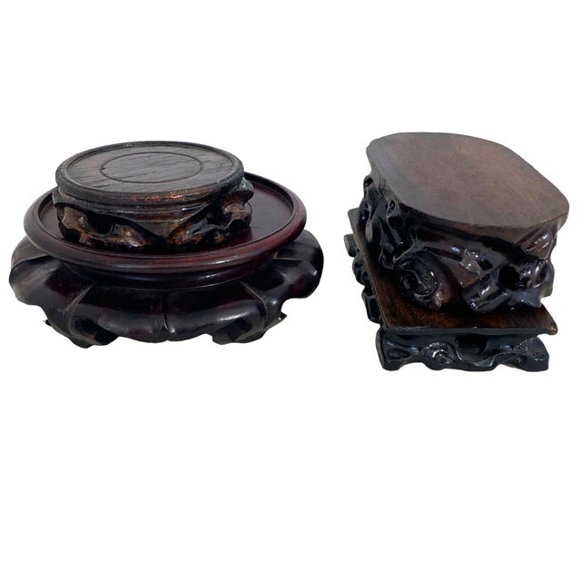 Chinoiserie set of four Different Size Oriental solid carved wood stands for collectables, with open work make the perfect...
