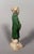 Sculpture of a Mingqi Servant, China, Ming Dynasty (1368-1644). Terracotta sculpture with green and brown glaze. Depicts a...