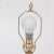 A Mid Century Modern Sculptural Lamp. Diamond Shape wooden column with brass mount details. Circa 1960. dia: 18" with shade