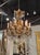 This luxurious 19th-century French gilt bronze and crystal chandelier is a stunning addition to any indoor space....