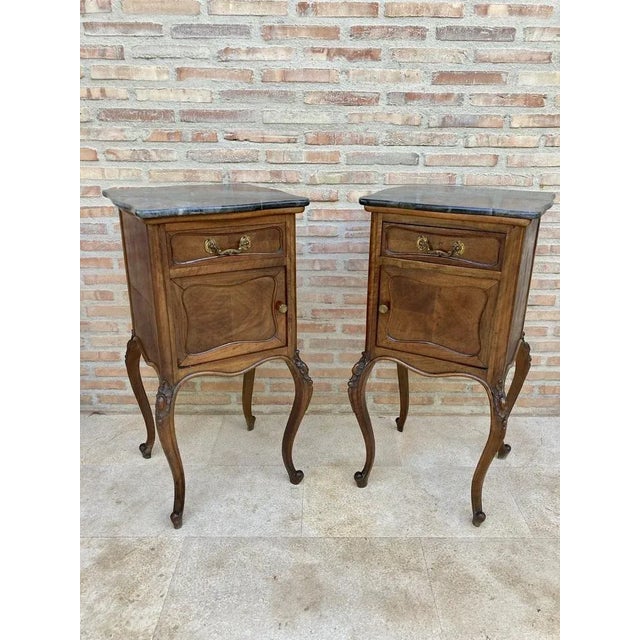 Pair of Louis XV Style Walnut Nightstands with Marble Top, 1930s. Beautiful pair of Louis XV style bedside tables, from...