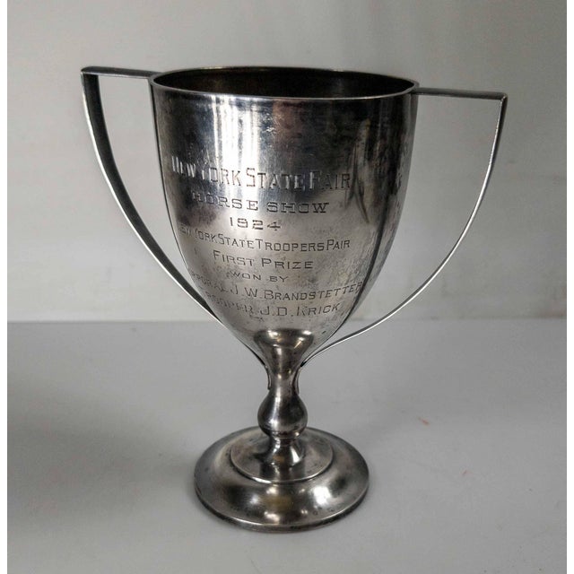 We are selling this interesting American Sterling Silver trophy by Black Starr & Frost. The engraving really makes this...