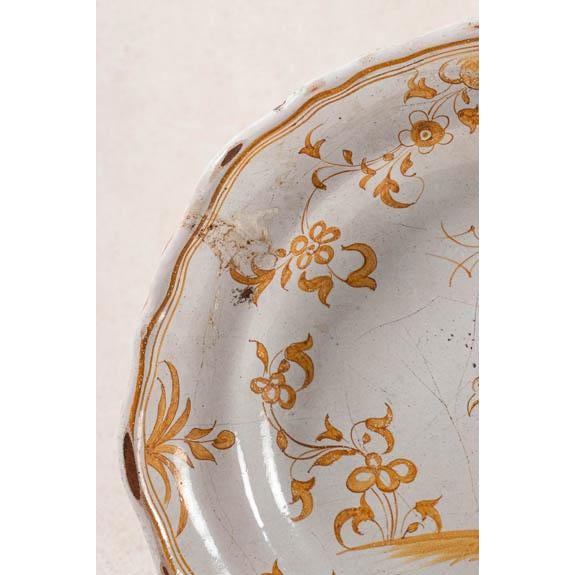 Sold with attached (removable) antique plate hanger. ABOUT Moustiers pottery (faïence de Moustiers) is highly celebrated...
