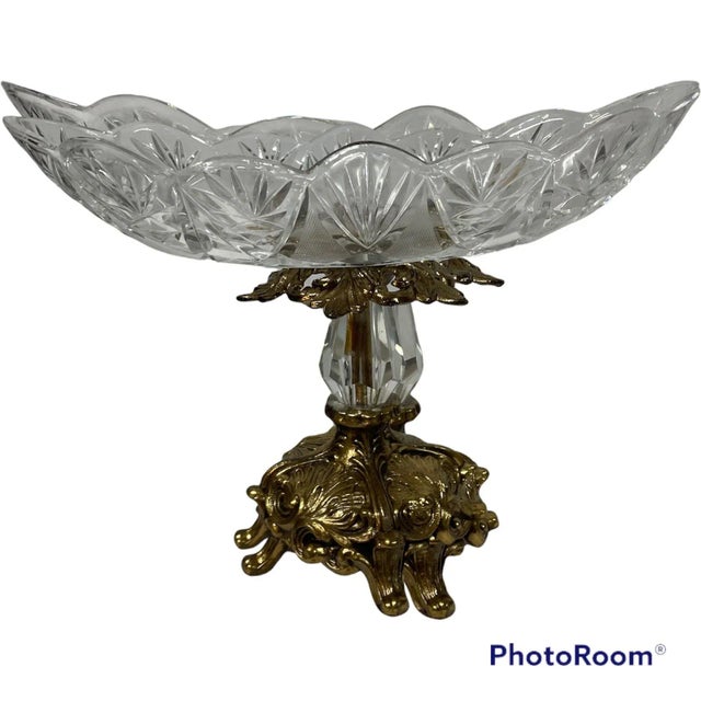 Antique Victorian brilliant cut glass compote with intricate art nouveau brass pedestal features intricate brilliant cut...