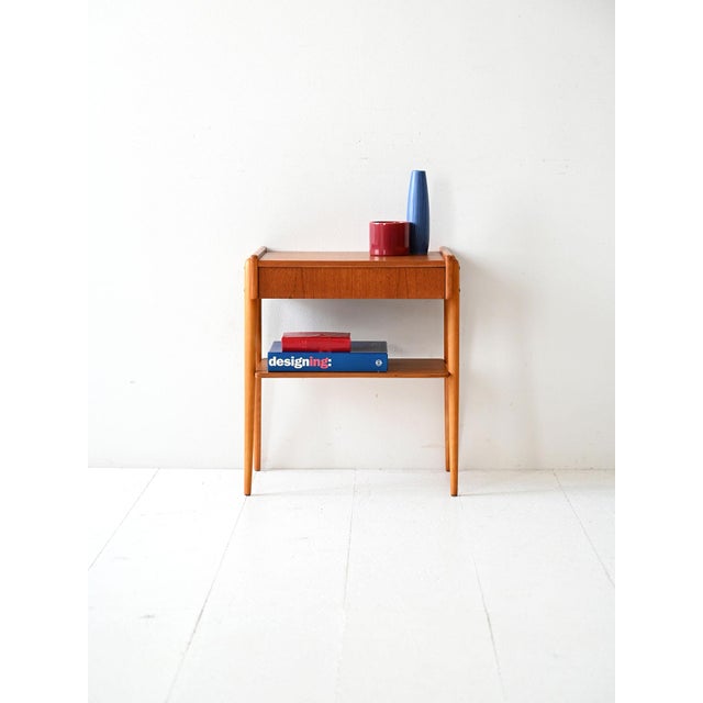 Vintage teak nightstand by ab carlström & co., with inverted v-shaped legs and a hidden drawer. original scandinavian...