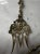 vintage Italian Baroque-style serving set features an ornate, pierced brass fork and spoon crafted in Italy, frequently...