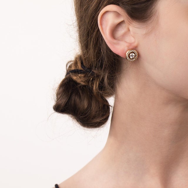 These elegant vintage diamond stud jacket earrings are a polished 1990’s design, featuring 2 round brilliant cut diamonds...