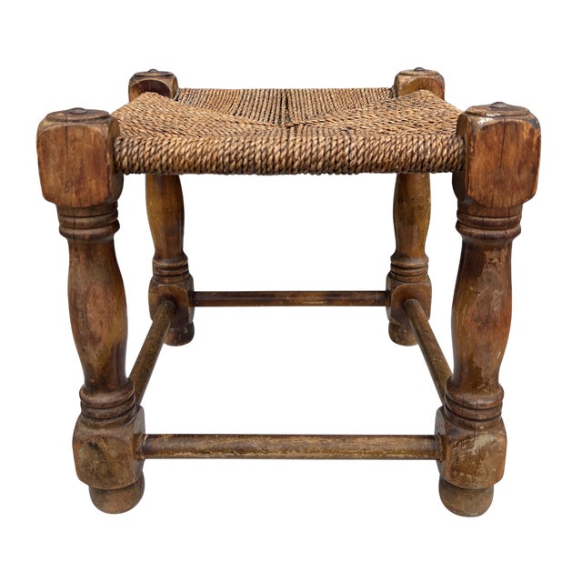 Circa 1940s England. Crafted from solid oak with beautifully turned legs and a handwoven natural rush seat, this vintage...