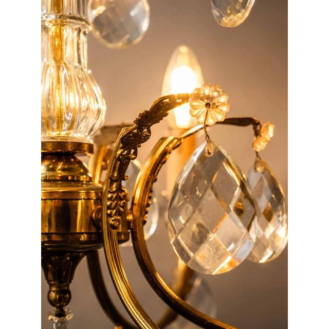 Restored electrical installation. The chandelier is cleaned and fully functional. Hand-cut and polished trimmings....
