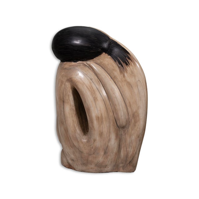 This sculpture is a large ceramic piece inspired by the style of Brancusi, depicting a nude woman in an exaggerated and...