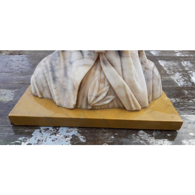 Marble bust of Libero Gremigni, Rome, 19th century, white veined marble, signed on the back, on a light brown marble base,...