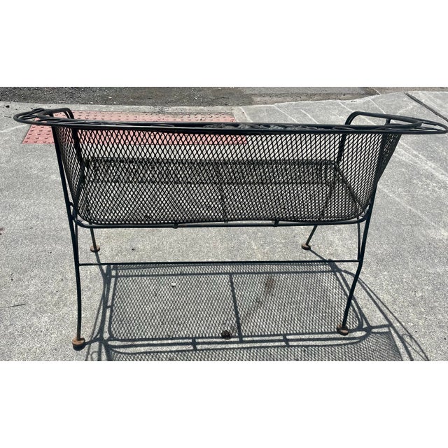 This is a fantastic looking, hard to find model and very comfortable wrought iron loveseat with a diamond mesh barrel...