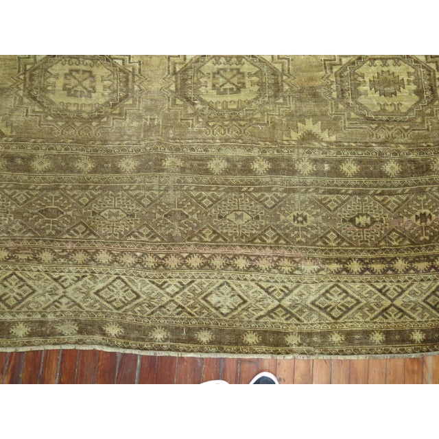 An early 20th century oversize Afghan Tribal Ersari rug. Not chemically or antique washed. Measures: 131'0'' x 23'5''.