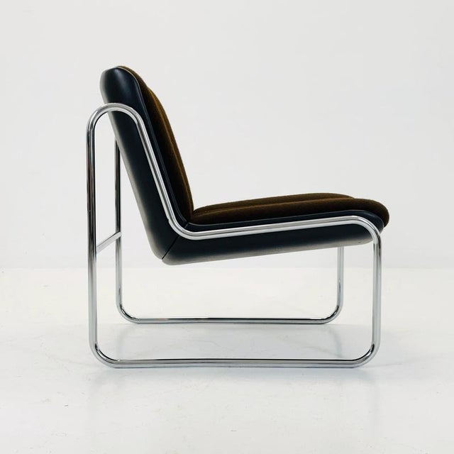 Elevate your interior with this rare Mid-Century Modern “Sling” lounge chair, a design attributed to Peter Hoyte for...
