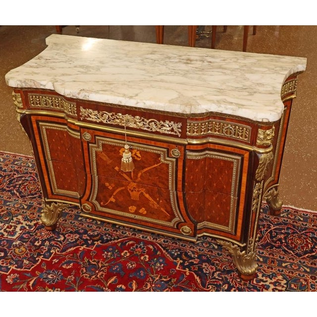 19th Century French Bronze Mount Inlaid Acajou Mouchete Riesener Style Commode Dimensions : 46" Wide X 21.25" Deep X 32"...