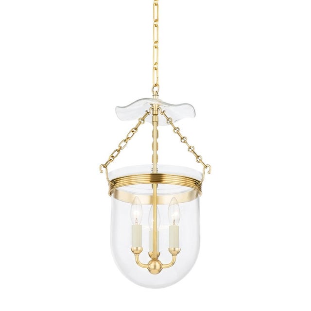 Rousham modernizes the traditional bell jar design with flowing lines and clean details such as ribbed metal banding and a...