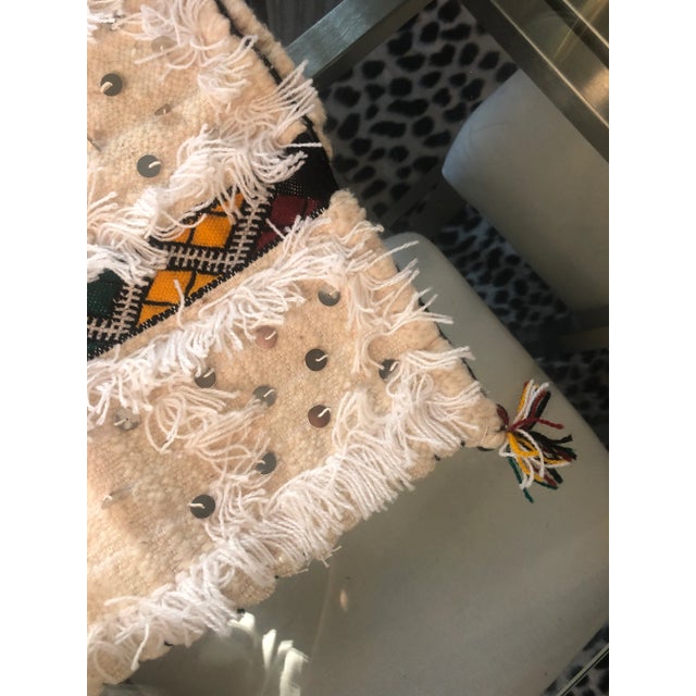 Moroccan pillow case that is gorgeously handmade! This was a souvenir from my travels to Morocco years ago. The material...