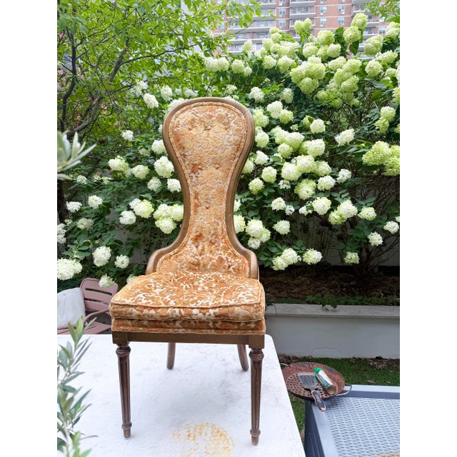 Stunning pair of vintage 1960s–1970s high-back statement chairs in the Hollywood Regency / French Neoclassical style....