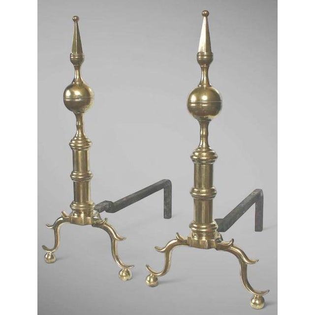 Federal Period Steeple Top Andirons This pair of fine American federal brass steeple-top andirons was passed down through...