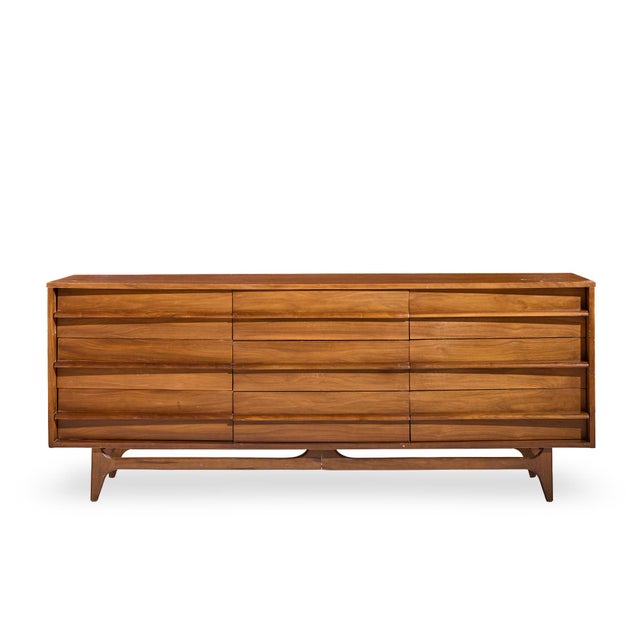 Young Manufacturing Mid Century Walnut Curved Lowboy Dresser This lowboy measures: 80 wide x 20.75 deep x 32.25 inches...