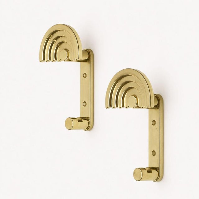 Postmodern brass wall coat hanger, model SE 314, designed by Ettore Sottsass in 1985 and made by Valli & Valleys in Italy....