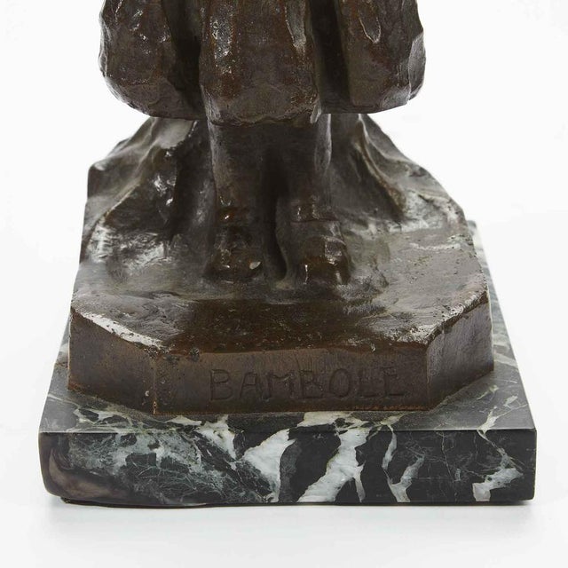 Renzo Zacchetti, Little Girl with Doll. Antique bronze sculpture from the Fascist era, circa 1938, depicting a little girl...