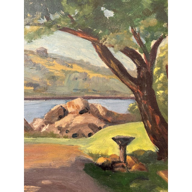 California Regionalism or Impressionism, produced in the mid-20th century. The scene depicts a coastal view with a winding...