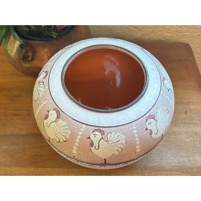 Rustic 20th century rooster vase painted in the style of early Pewabic pottery. Perfect for display in a rustic or country...