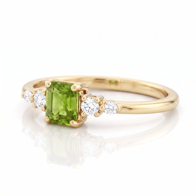Infuse your daily ensemble with the lively, fresh radiance of olive green peridot. Showcasing an eye-clean square-cut...
