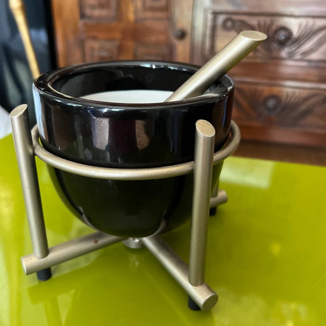 Delve into the timeless art of handcrafted pottery with a vintage marble mortar and pestle. For centuries, artisans have...