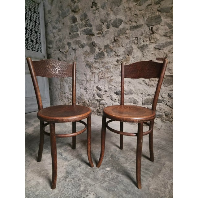 A set of two antique bentwood bistro chairs by Fischel Austria, dating from the early 20th century, circa 1900–1915. Both...