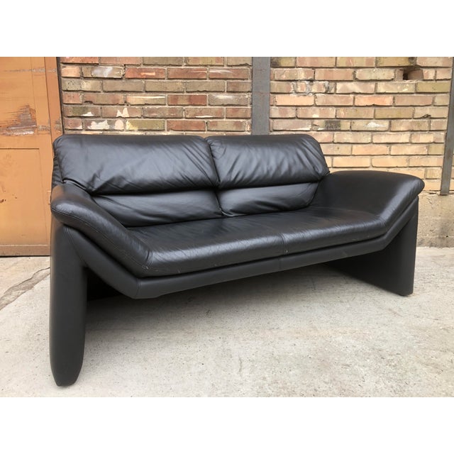 Two-Seater Sofa in Black Genuine Leather by Hans Kaufeld for de Sede, 1980s, in Very Good conditions. Designed 1980 to...