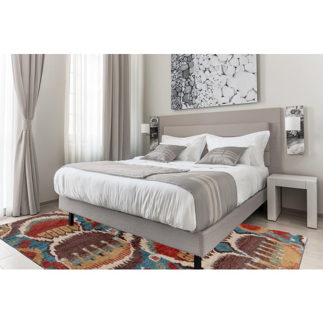 Beautiful Moroccan- Style hand-made wool rug with a multi-color field in a gorgeous all-over abstract geometric design....