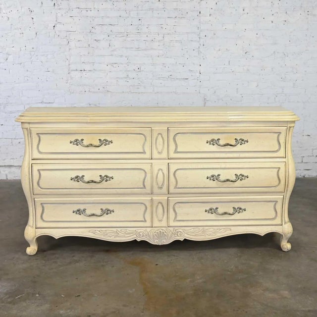 Magnificent French Provincial or Hollywood Regency style antiqued or cerused white dresser or credenza by the Prince...