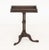 Edwardian Mahogany Stained Side Table, the stem a cluster of three columns above three cabriole legs. 23" H x 18" W x 18"...