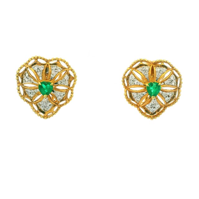 A romantic pair of late-20th-century Italian earrings crafted in 18K yellow gold. Designed in an openwork heart...